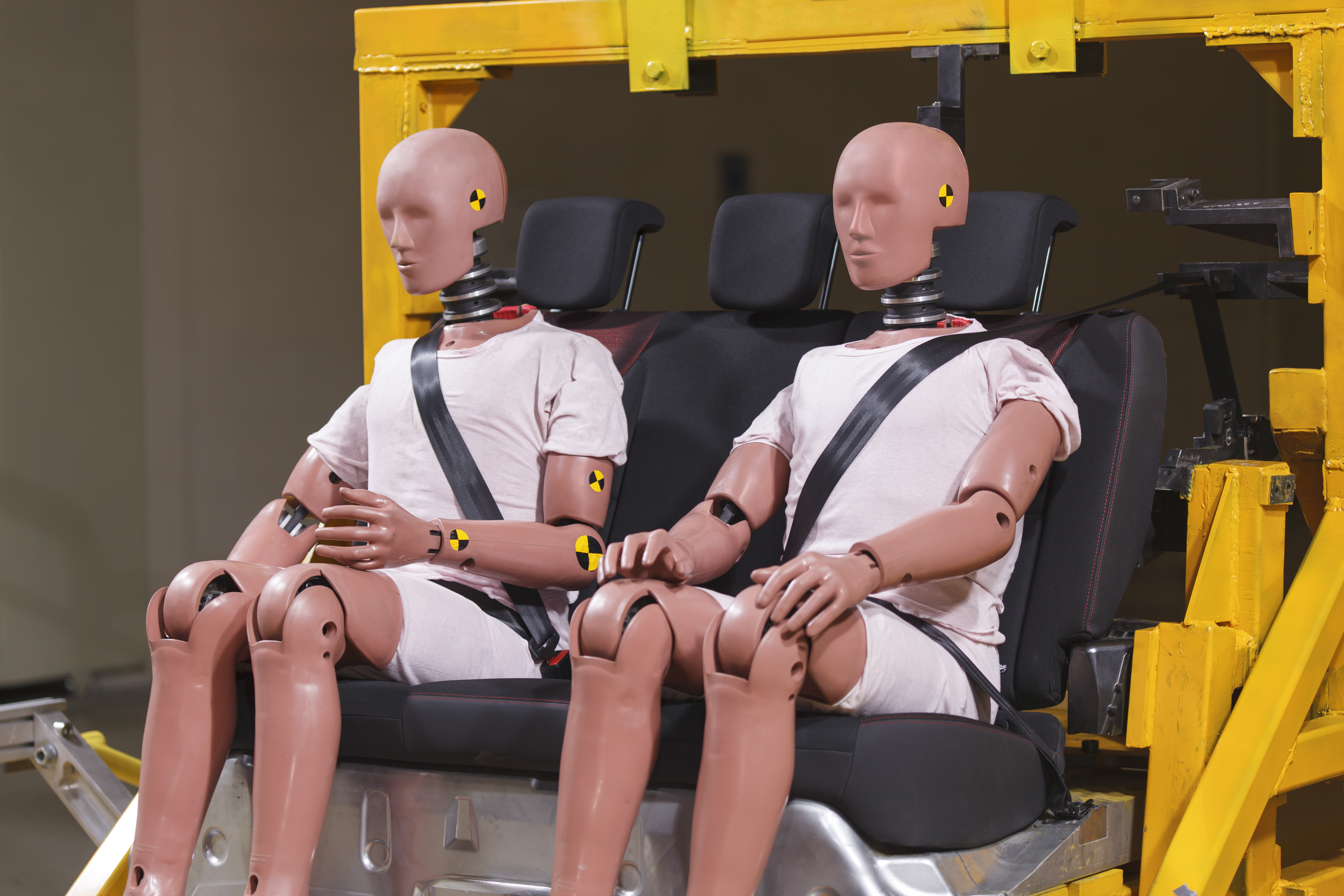 Two crash test dummies in chairs Two dummy are ready for crash taste